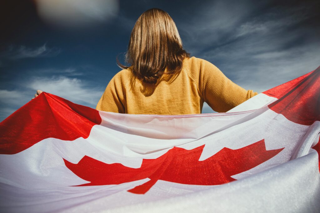 Someone Holding a Canadian flag